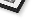 A picture of a white picture frame with a white background with gray art in it.