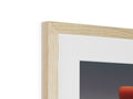 A wooden picture frame holds an image in a frame with wood on it.