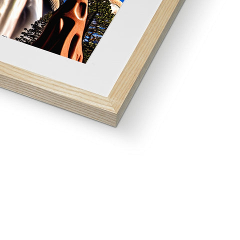 A photo of a picture frame, framed in wooden furniture on