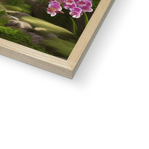 A wood framed photograph of a picture with flowers outside that is hanging on a wood frame