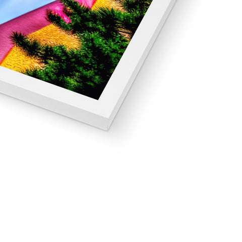An iPad with a side view of some colorful pixels.