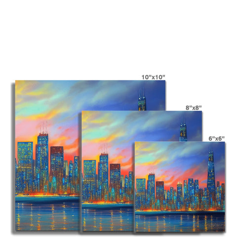 A group of art print on a wall with large buildings and a city skyline.