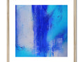 A framed photo of an abstract painting with a large blue wall hanging and blue wall.
