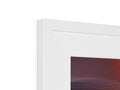 A white picture frame with a picture of an  Imac on it.