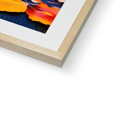 A soft cover photo shot of an artistic print in a wood frame.