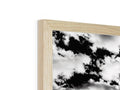 A black and white panorama of cloud and clouds on a wood frame.