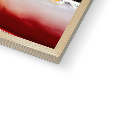 A white wood framed photo of a cook book sitting on a table, it can be