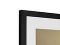 A picture frame sitting on top of a small black screen monitor next to some photographs.