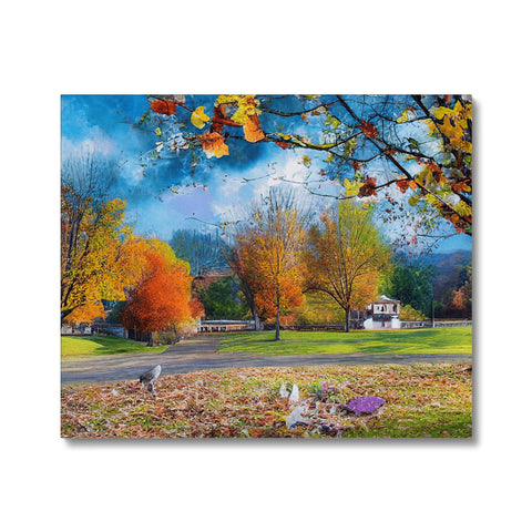 A picture of blue fall foliage and an artwork print.