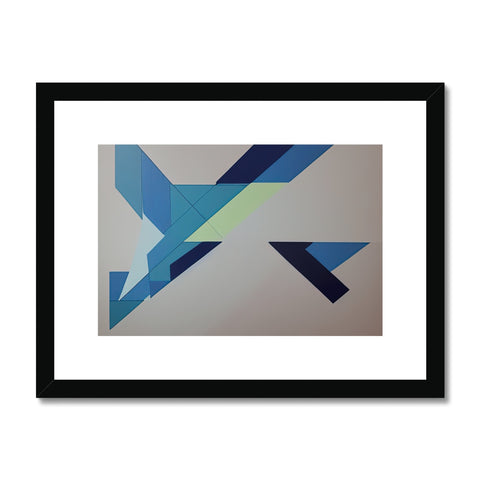 An abstract collage print of an arrow with both sides of the same line.