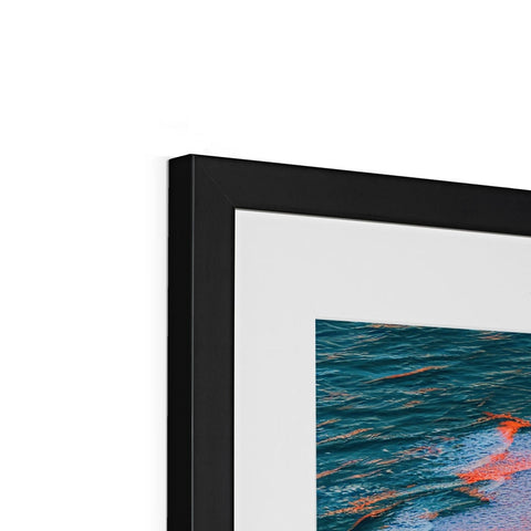 An image of a picture frame sitting on top of a large black background.