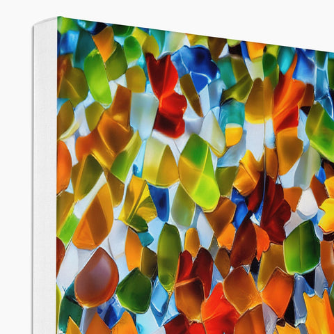 A set of glass tiles decorated with colorful art on a white white shelf.