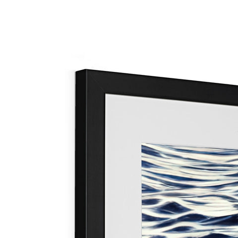a view of a TV on a picture frame with a blue and white piece of art