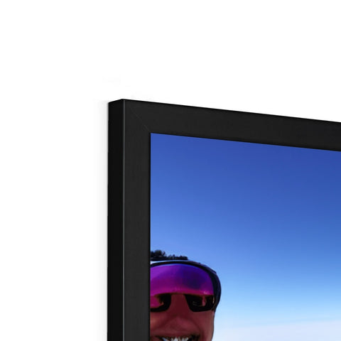 A picture frame with an over top of a flat screen TV with an empty background.