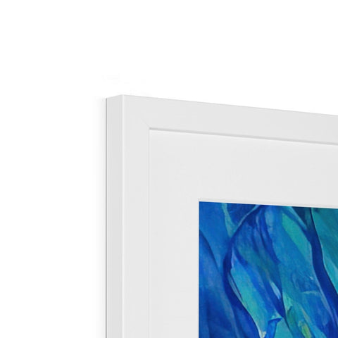 A picture of a painting sitting on a white picture frame sitting on top of a blue