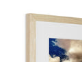 A picture of artwork on a box in blue and white wood frame