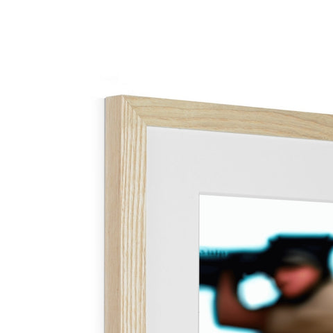 A frame that is a couple of wooden frames with a picture of a man posing and