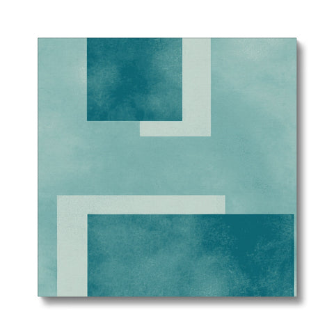 a white and teal tile wall that is shaped to double in size