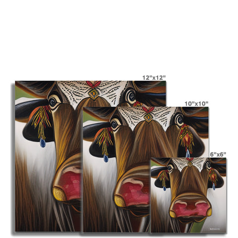 Art prints of cows standing on top of an artificial wood wall.