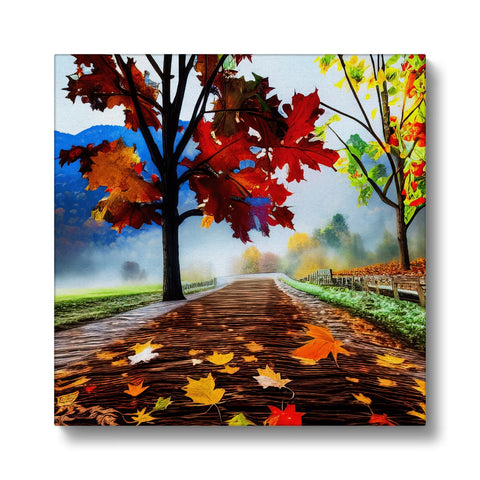 A piece of art prints on paper on fall foliage beside a tree with some buildings.