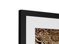 A picture of gold artwork on a white frame in a metal frame is very modern looking