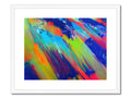 An artistic art print with various colors on it sitting on top of a wall.