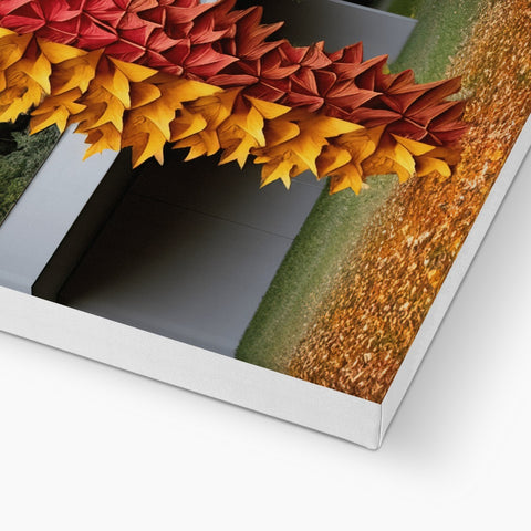 A picture of two different kinds of autumn foliage and a leaf on a picture frame.