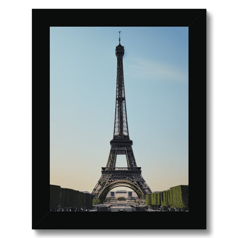 A large photo of a picture frame depicting a large tower in Paris.