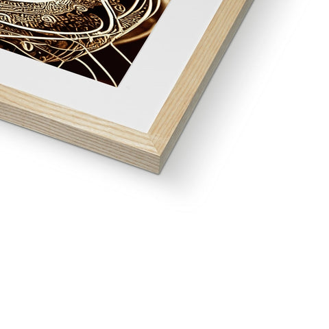 An art print of gold foil photo hanging on the side of a wooden frame.