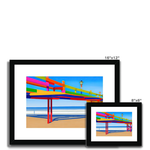 Three colorful art prints in a large photograph frame along with a photo card.
