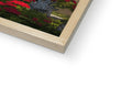 A picture of a wooden frame with poinsettia on the edges.