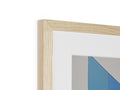 A frame that is on a shelf next to a small white piece of wood.