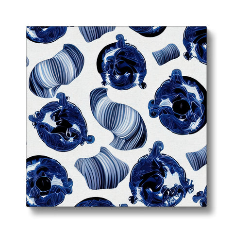 A white and blue art print hanging from a white tablecloth.