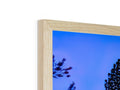 A wooden photo frame with a picture of a tree on it’s top side