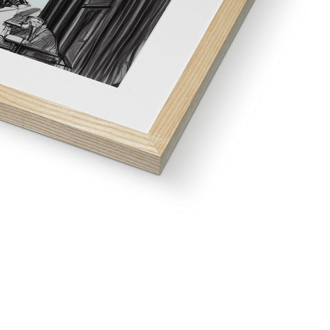 A view of a wooden wooden frame sitting next to an image on white paper.