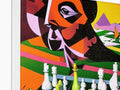 a chess game board with a painting on it sitting on a softcover cover
