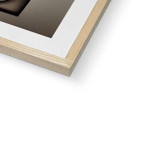 A picture frame filled with a photograph on a white background in a book.