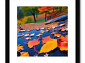An art print with a colorful picture of autumn fall foliage on a wall.
