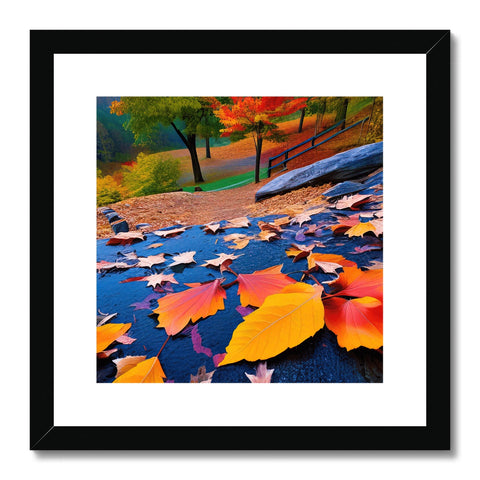 An art print with a colorful picture of autumn fall foliage on a wall.