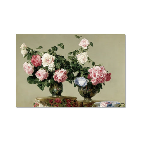 A picture of roses on a white background in a blue and pink vase.