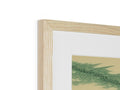 A picture frame that is filled with wood in a green background.