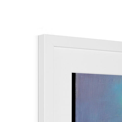 A photo of an imac on a white picture frame sitting on a wall.