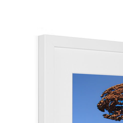 An   imac frame in a frame with a photo of a child inside with