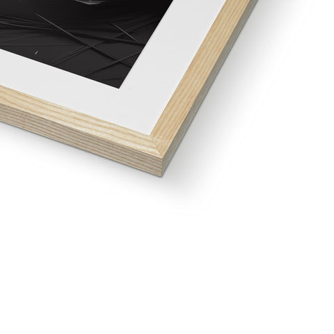 a black photo frame filled with wood by white photograph on two sides.