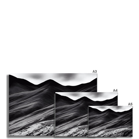Black and white photo of views of mountains and mountain peaks
