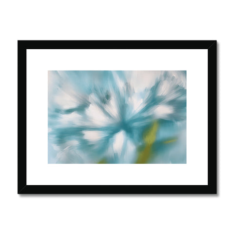 A picture of a flower in a frame framed in white.
