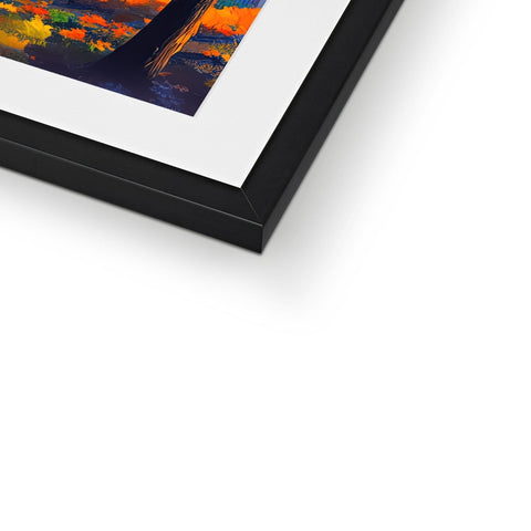 An art print on a wooden frame with different colors on it on a wood table.