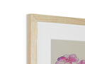 A picture can be seen on a small frame with wood frames next to it.