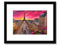 An art print of a photo of a bicyclist on a street in Paris.