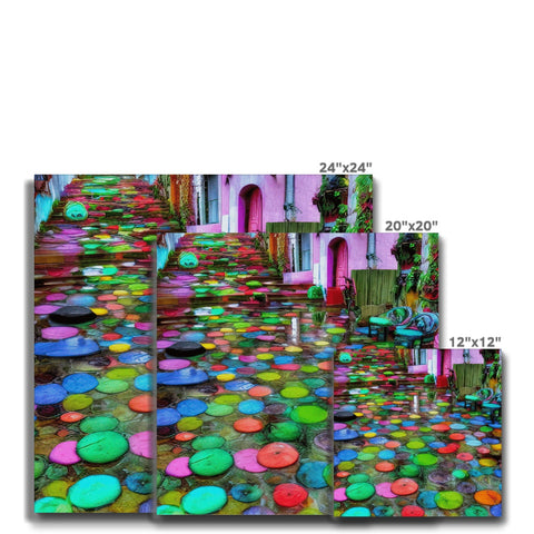 A picture hanging on a wall of colored tile with multiple colors next to an umbrella